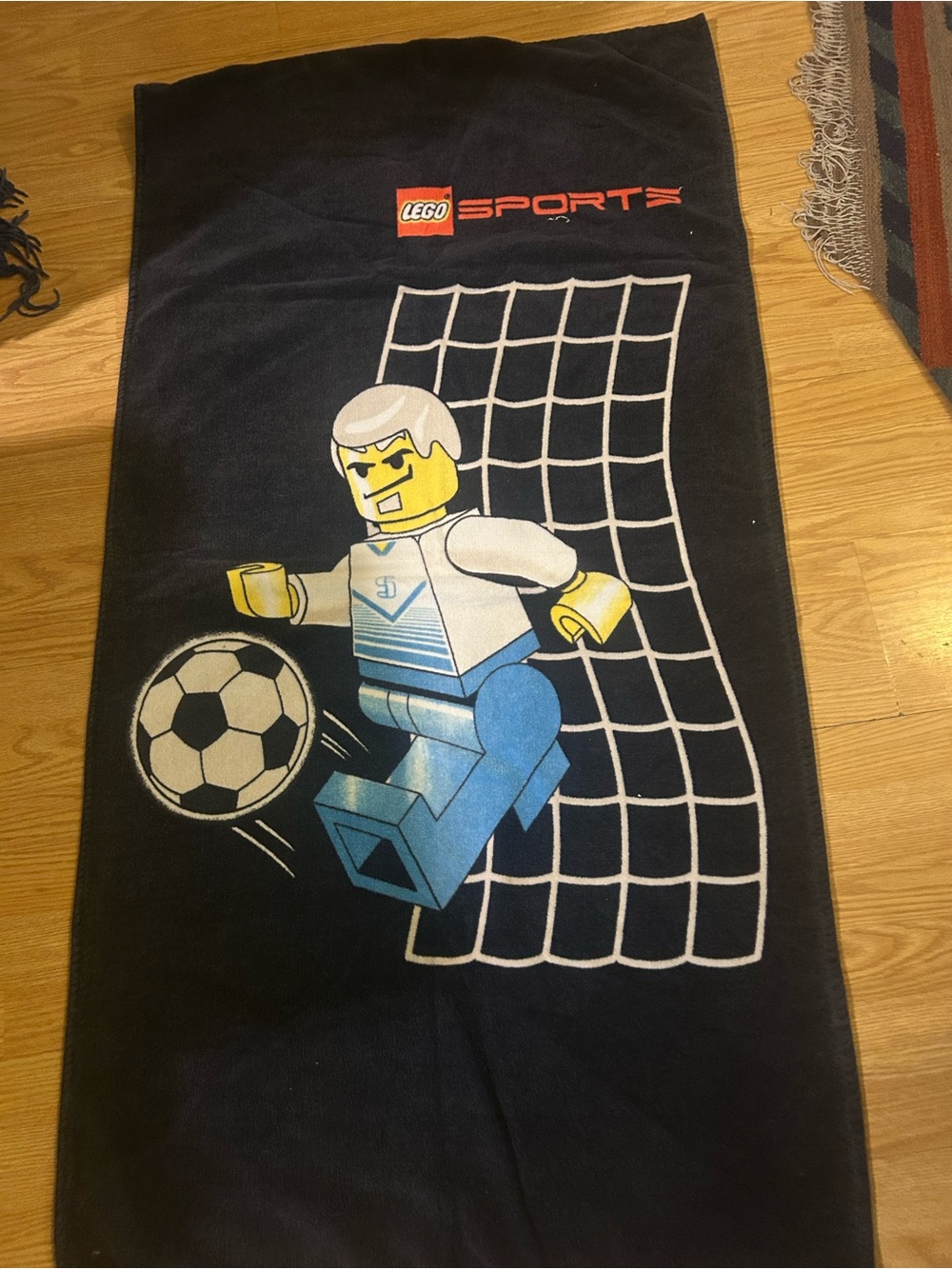 Lego Sports Black Towel with Blue Minifigure Soccer Graphic